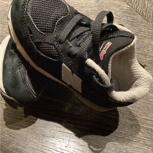 New Balance Kids Black and White Athletic Sneakers